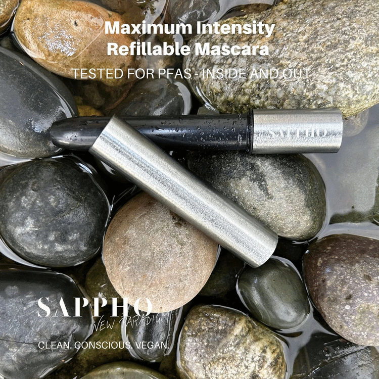 Sappho New Paradigm Mascara on a bed of pebbles